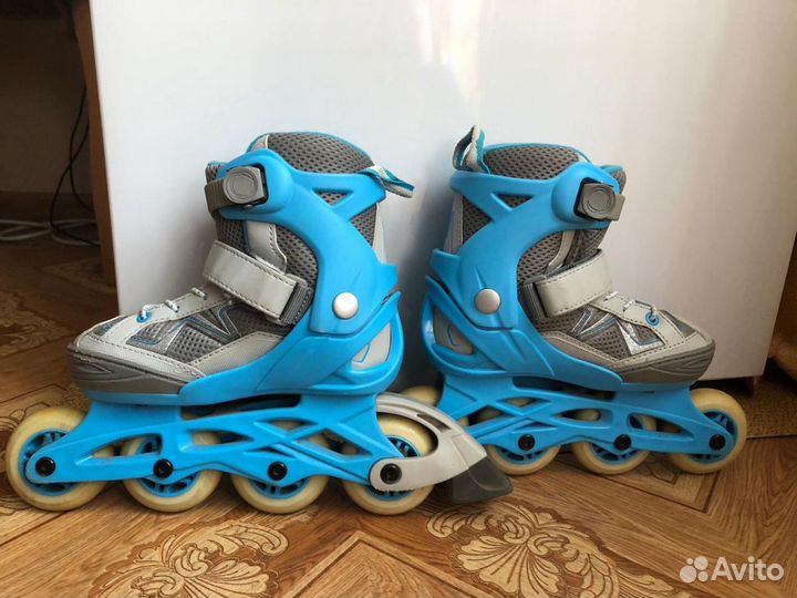 Роликовые коньки