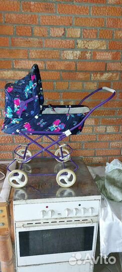 Игрушечная коляска для кукол