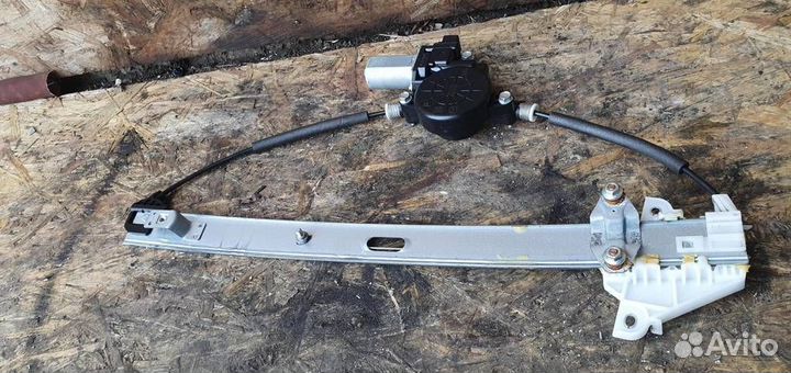 Стеклоподъемник электрический передний левый Mazd