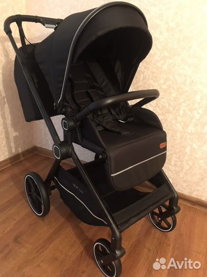 Коляска новая прогулочная с реверсивным блоком