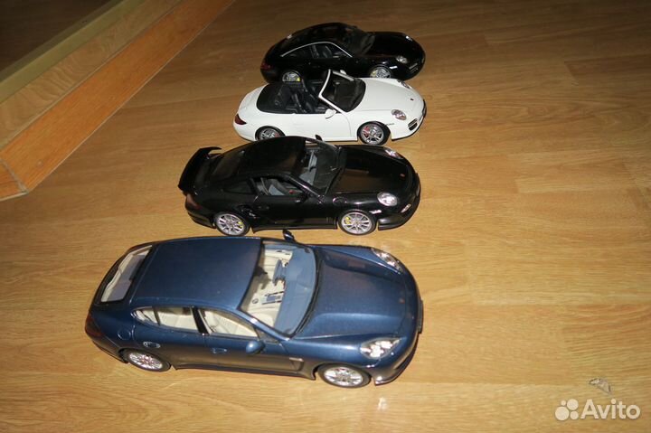 Модели 1:18 Porsche Norev