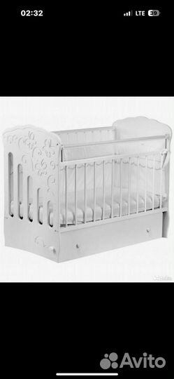 Детская кроватка с маятником и ящиком