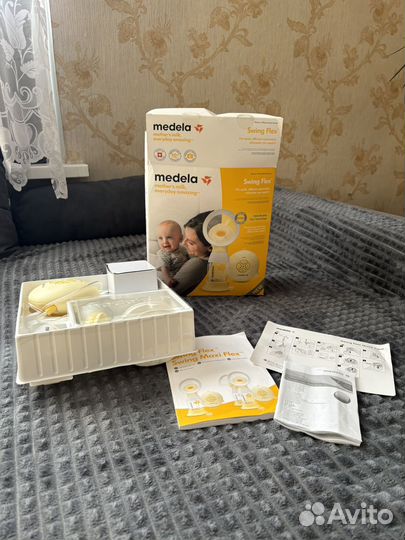 Молокоотсос medela swing flex