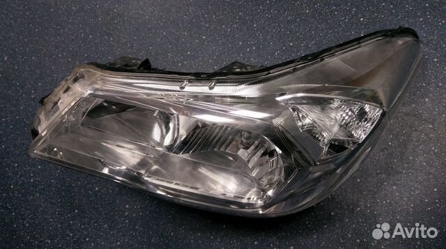 Стекло фары L Forester 2007