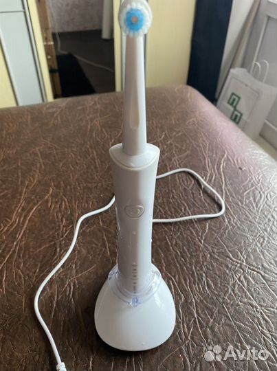 Электронная зубная щетка