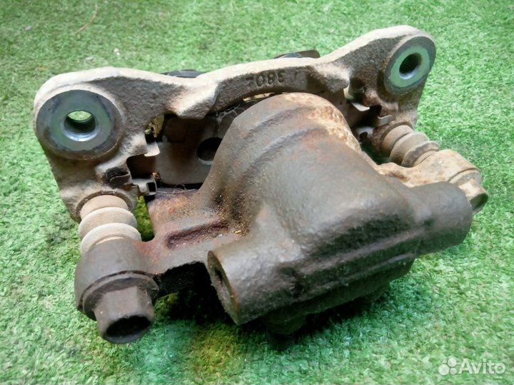 Суппорт задний левый Mitsubishi Lancer 10 4B11