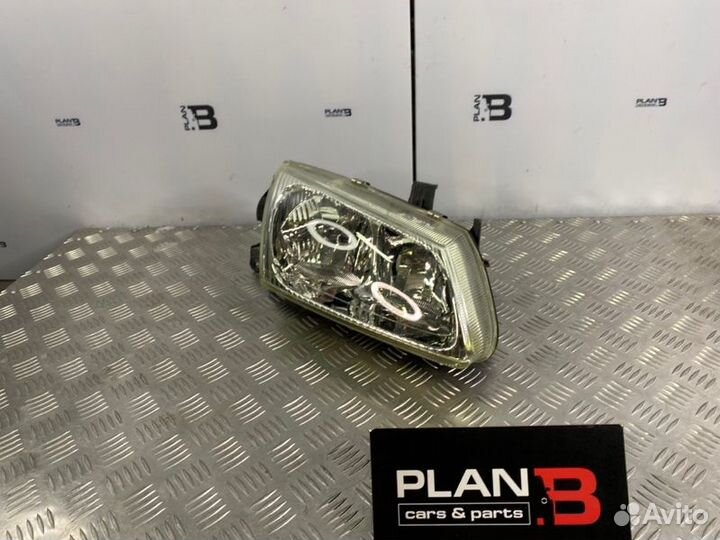 Фара галогеновая передняя правая Nissan Almera N16