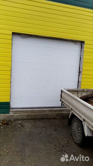 Высокие секционные ворота с установкой