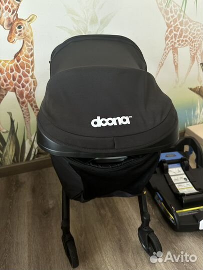 Коляска автокресло Doona с базой isofix