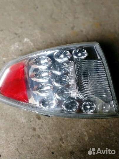 Задний левый наружный фонарь Subaru 84912FG030