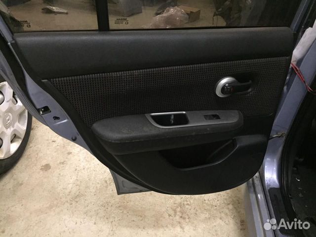 Обшивка двери задняя левая Nissan Tiida