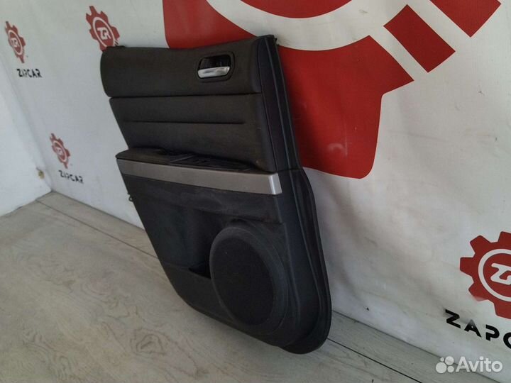 Обшивка задней левой двери Mazda CX7