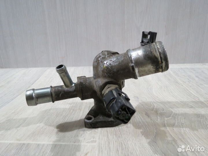 Корпус термостата Kia Rio 3