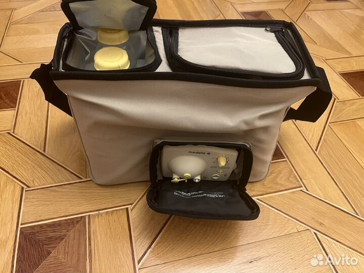 Молокоотсос medela электрический