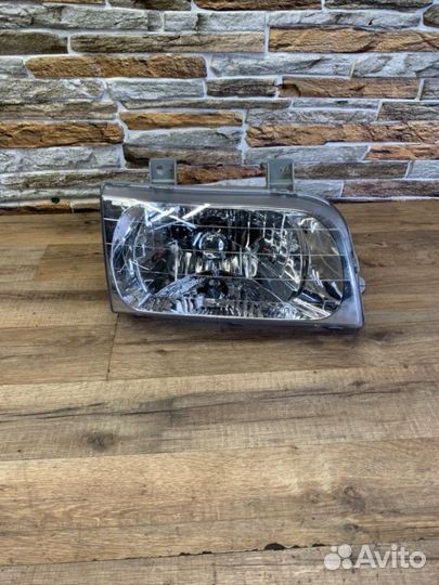 Фара Kia Sportage I