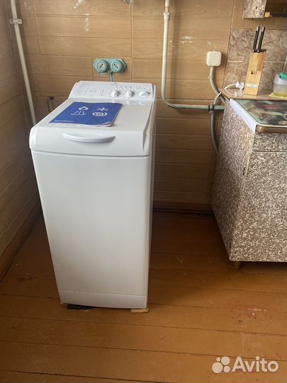 Стиральная машина с вертикальной загрузкой