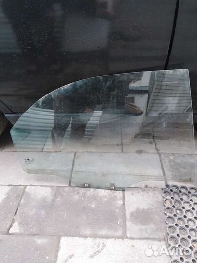 Стекло двери задней правой Kia Spectra