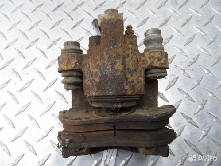 Суппорт задний левый Ford Explorer 4