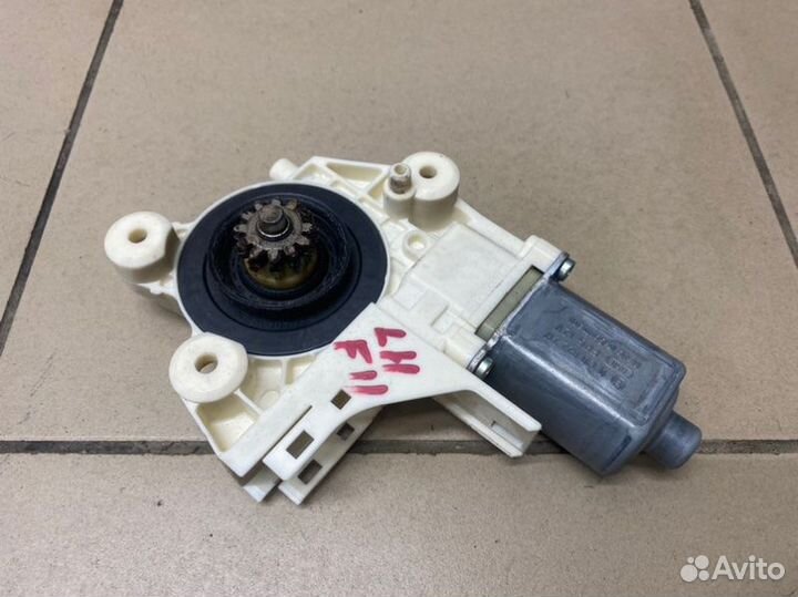 Моторчик стеклоподъемника передний левый Ford