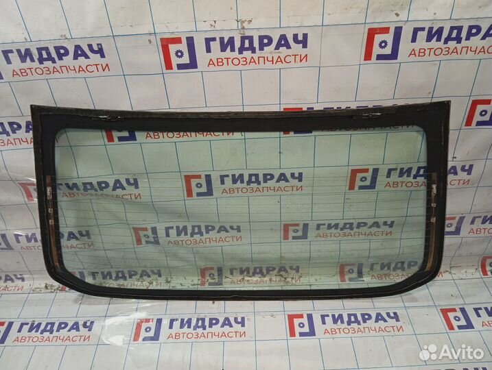 Стекло заднее Nissan Tiida (C11) 79700-EL100