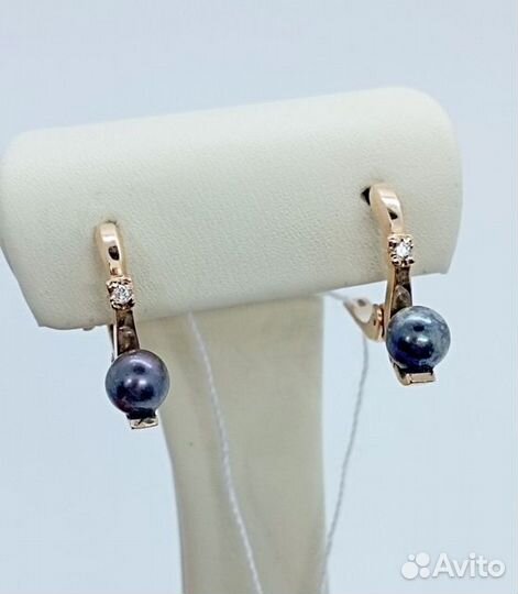 Золотые серьги с камнем