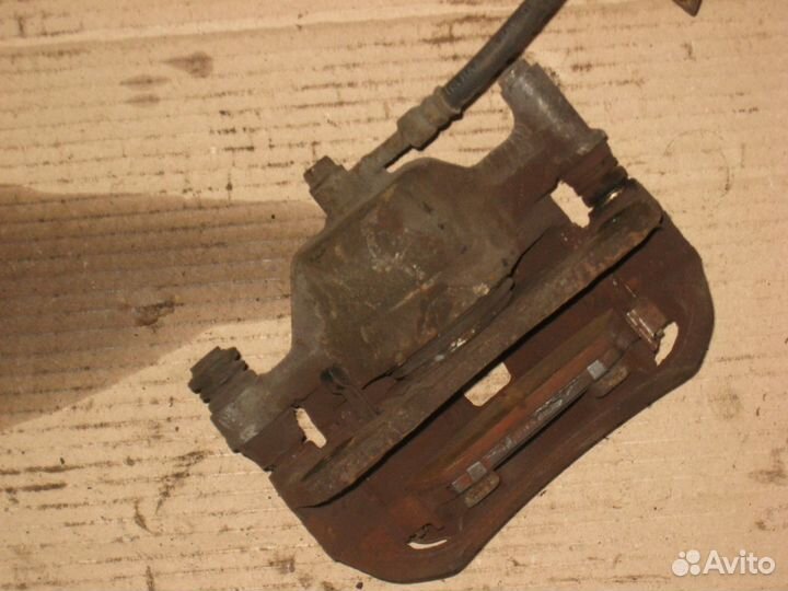 Суппорт тормозной передний правый Hyundai Getz