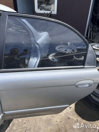 Задняя левая дверь Киа Спектра
