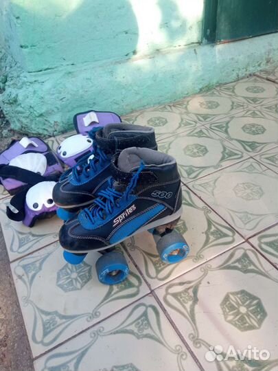 Роликовые коньки