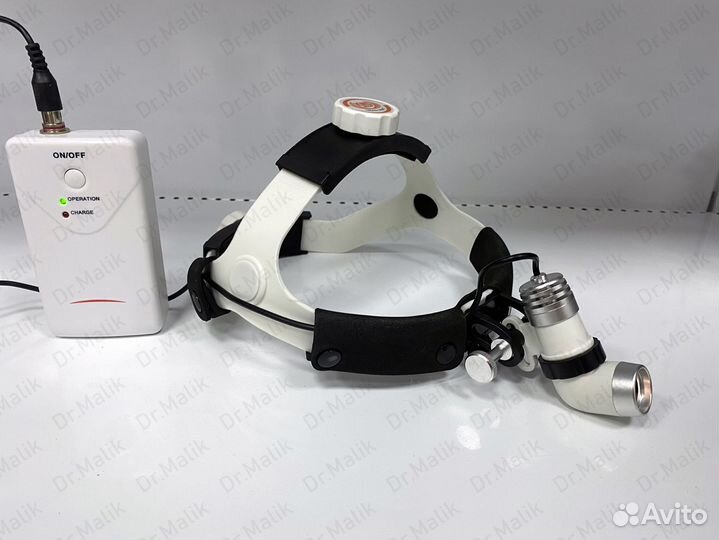 Налобный осветитель