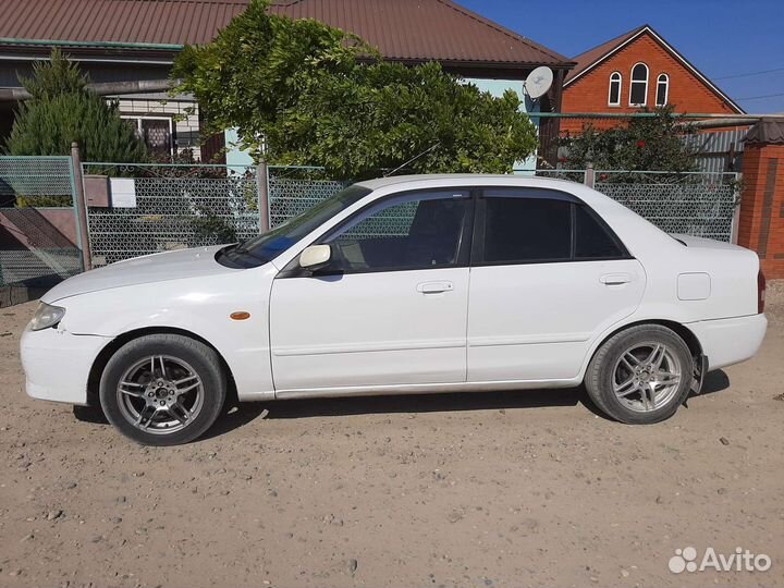 Mazda Familia 1.5 AT, 2000, 399 400 км