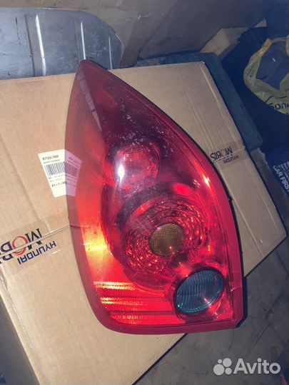 Фонарь задний левый Ниссан Примера Р12