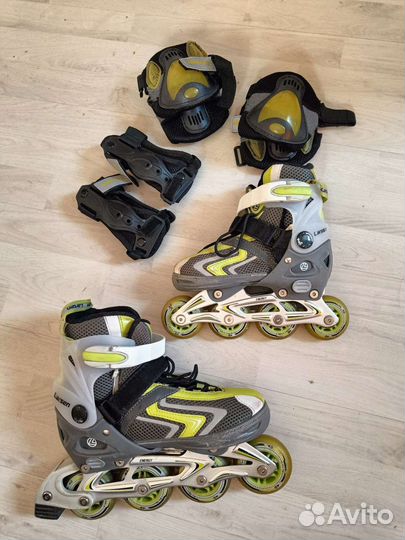 Роликовые коньки