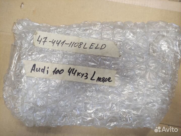 Стекло фары левой audi 100 83-90