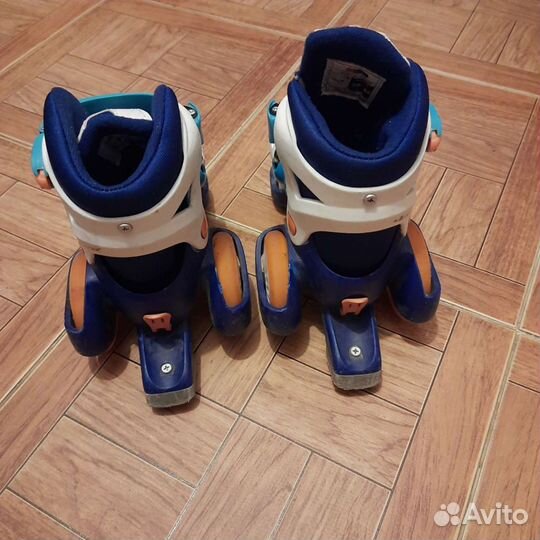 Роликовые коньки раздвижные четырехколесные