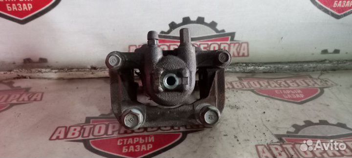 Суппорт тормозной задний правый Honda Cr-V RM4