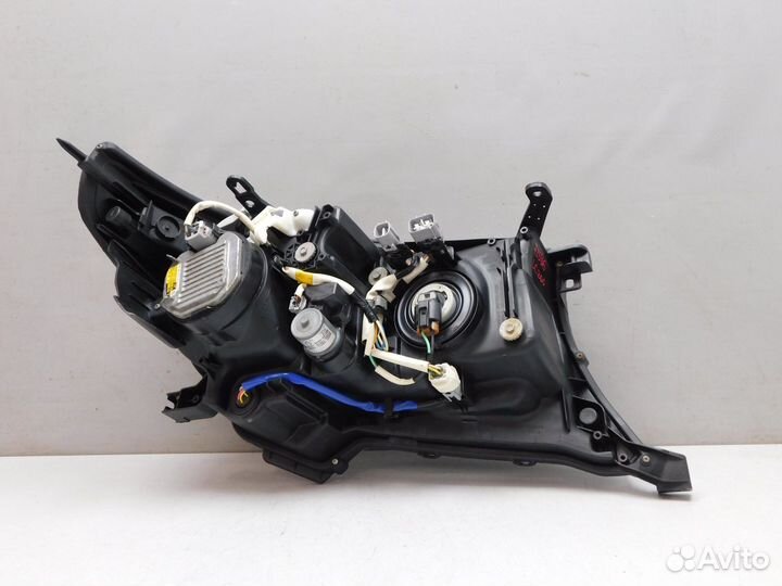 Фара левая Toyota Land Cruiser