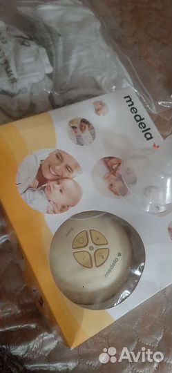 Молокоотсос medela электрический