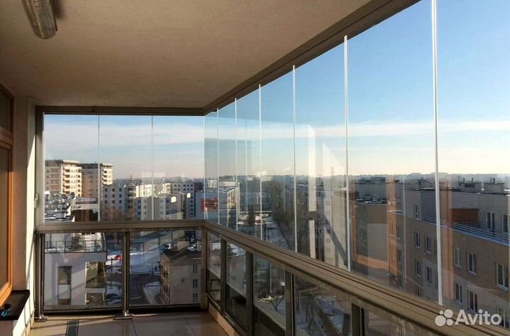 Безрамное раздвижное остекление