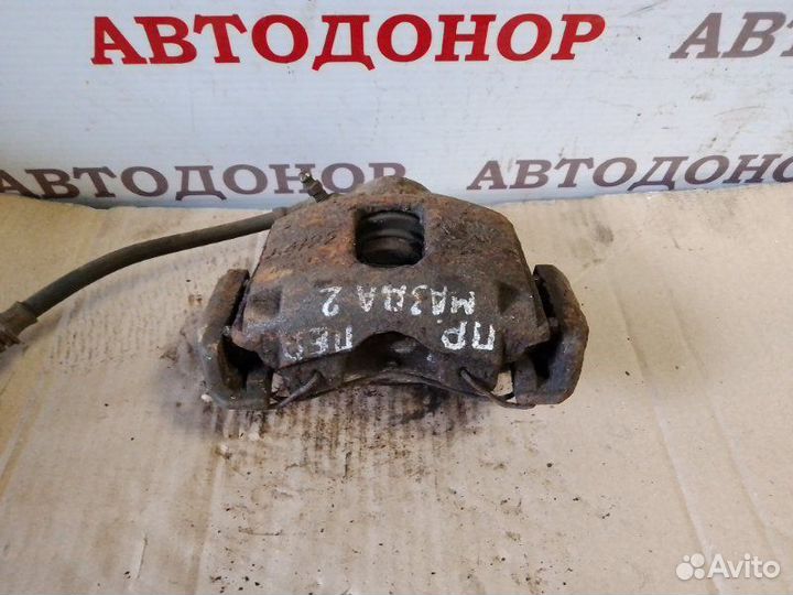Суппорт тормозной передний правый Mazda 2 1.25