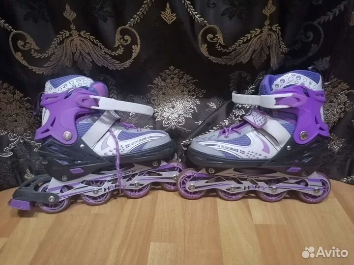 Роликовые коньки
