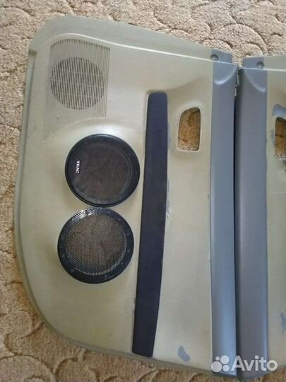 Дверные карты Мазда Демио 2