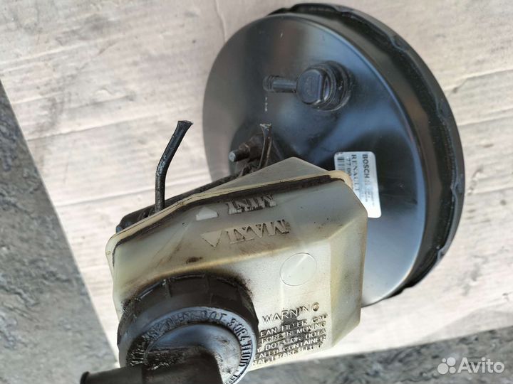 Вакуум тормозной Рено символ в сборе