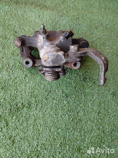 Суппорт задний левый Nissan Avenir PW11 SR20DE