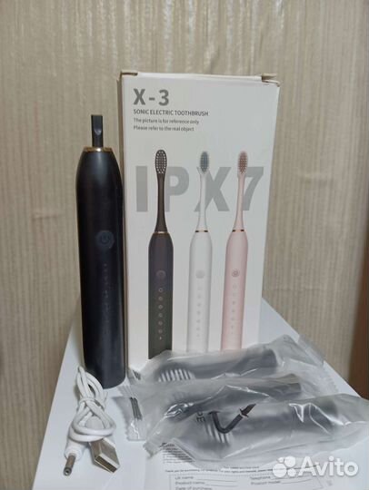 Электрическая зубная щётка