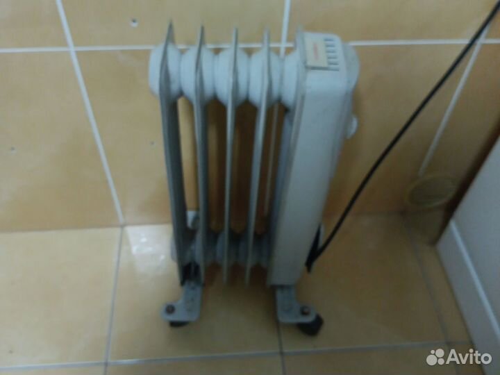 Масляный обогреватель