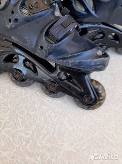 Роликовые коньки