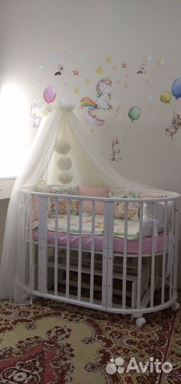 Детская кроватка с продольным маятником