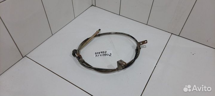 Трос стояночного тормоза левый (Chery Tiggo 2)