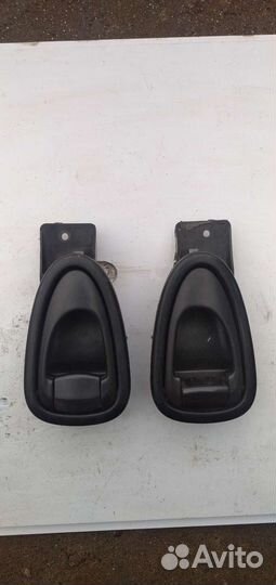 Внутренние ручки дверей на Шевроле Ланос