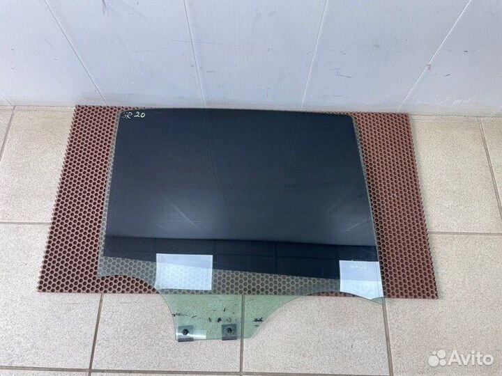 Стекло двери заднее правое Renault Logan